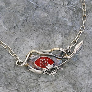 Claude Abittan - Signature Cobra Necklace on marble grey background